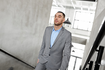 Image showing businessman walking upstairs