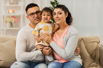 Image showing happy family with baby daughter at home