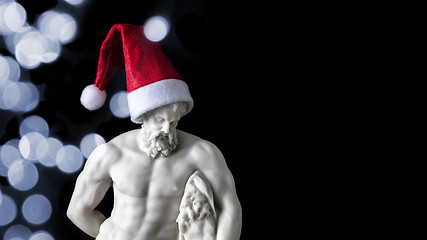 Image showing muscular male figure with a Santa Claus hat