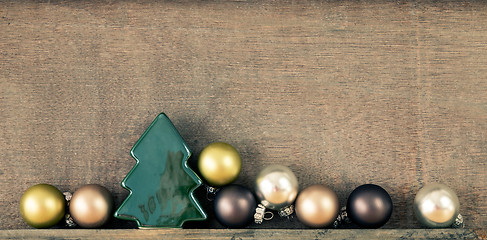 Image showing Christmas decoration glass balls with wooden background