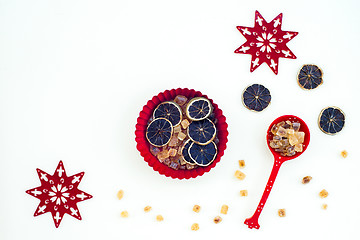 Image showing Christmas decor with brown sugar and dried lemon slices