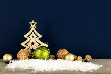 Image showing Christmas decoration dark background with wooden tree glass ball