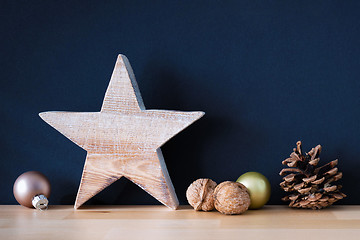 Image showing Christmas decoration glass balls with wooden star and nuts