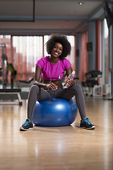 Image showing woman  relaxing after pilates workout