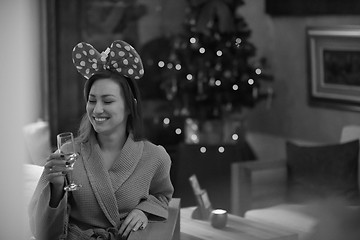 Image showing woman drinking champagne at spa