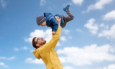 Image showing father with son playing and having fun outdoors