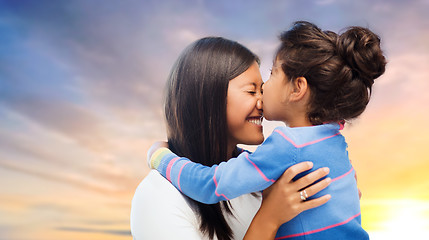 Image showing happy mother and daughter hugging and kissing