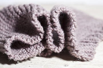 Image showing knitted brown scarf