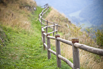 Image showing Italian landscape, hills and wooden handrails.