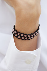 Image showing Stylish black bead bracelet on female hand