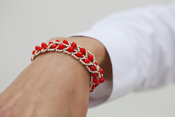 Image showing Stylish red bead bracelet on female hand