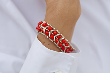 Image showing Stylish red bead bracelet on female hand 