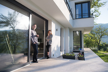 Image showing couple enjoying on the door of their luxury home villa