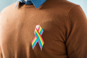 Image showing man with gay pride rainbow awareness ribbon