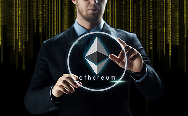 Image showing businessman with ethereum over binary code