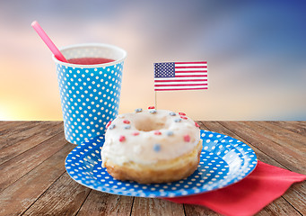 Image showing donut with american flag decoration and drink