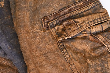 Image showing Trousers with mud