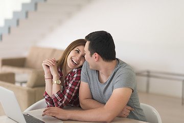 Image showing happy young couple buying online