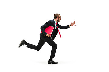 Image showing Businessman running with a folder on white background