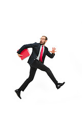 Image showing Businessman running with a folder on white background