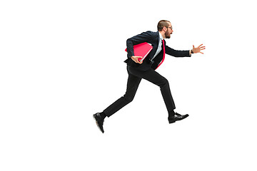 Image showing Businessman running with a folder on white background