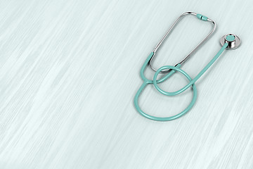 Image showing Stethoscope on wood background