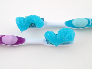 Image showing Two Toothbrushes with Gel Paste