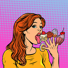 Image showing Beautiful woman licking sweets from her fingers