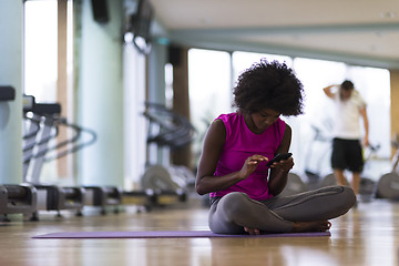 Image showing african american woman exercise yoga in gym