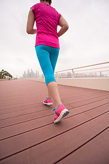 Image showing woman running on the promenade