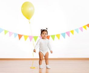 Image showing baby girl with balloons on birthday party