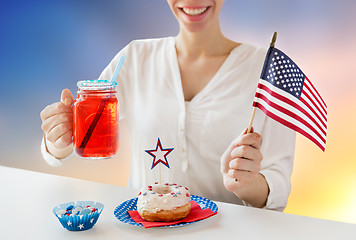 Image showing happy woman celebrating american independence day