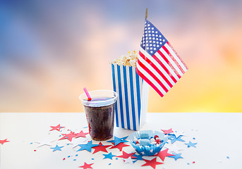 Image showing cola and popcorn with candies on independence day