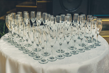 Image showing Table with champagne glasses, rustic toned