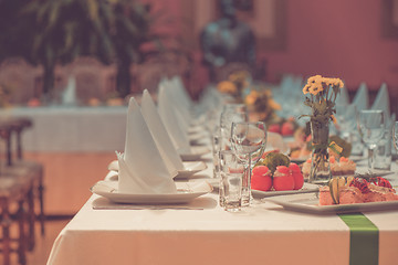 Image showing Long served table with dishes