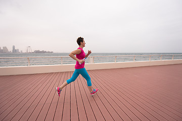 Image showing woman running on the promenade