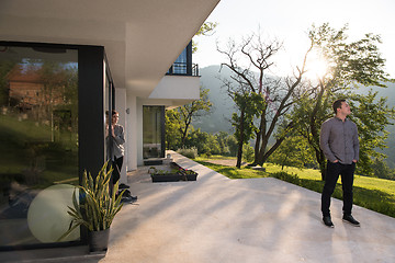 Image showing man in front of his luxury home villa