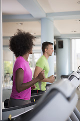 Image showing people exercisinng a cardio on treadmill in gym