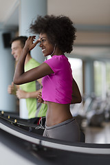 Image showing people exercisinng a cardio on treadmill in gym