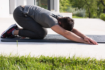 Image showing man doing morning yoga exercises