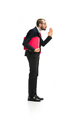 Image showing Choose me. Full body view of businessman with red folder on white studio background
