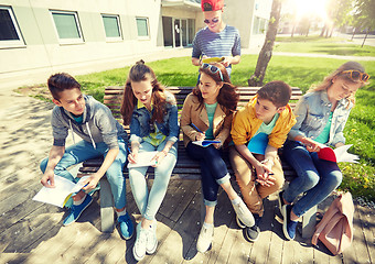 Image showing group of students with notebooks at school yard