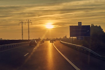 Image showing Driving in sunset