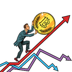 Image showing businessman roll a bitcoin coin up