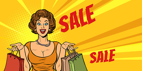 Image showing joyful woman shopping on sale