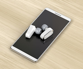 Image showing Wireless in-ear headphones and smartphone