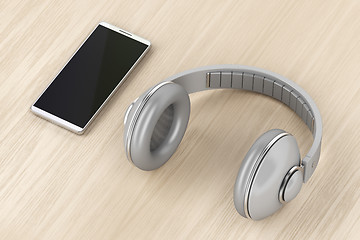 Image showing Over-ear headphones and smartphone