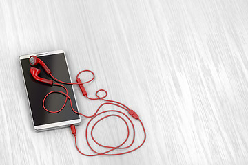 Image showing Smartphone and red earphones