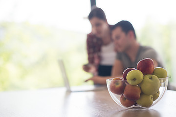 Image showing happy young couple buying online