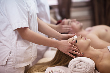 Image showing couple enjoying head massage at the spa